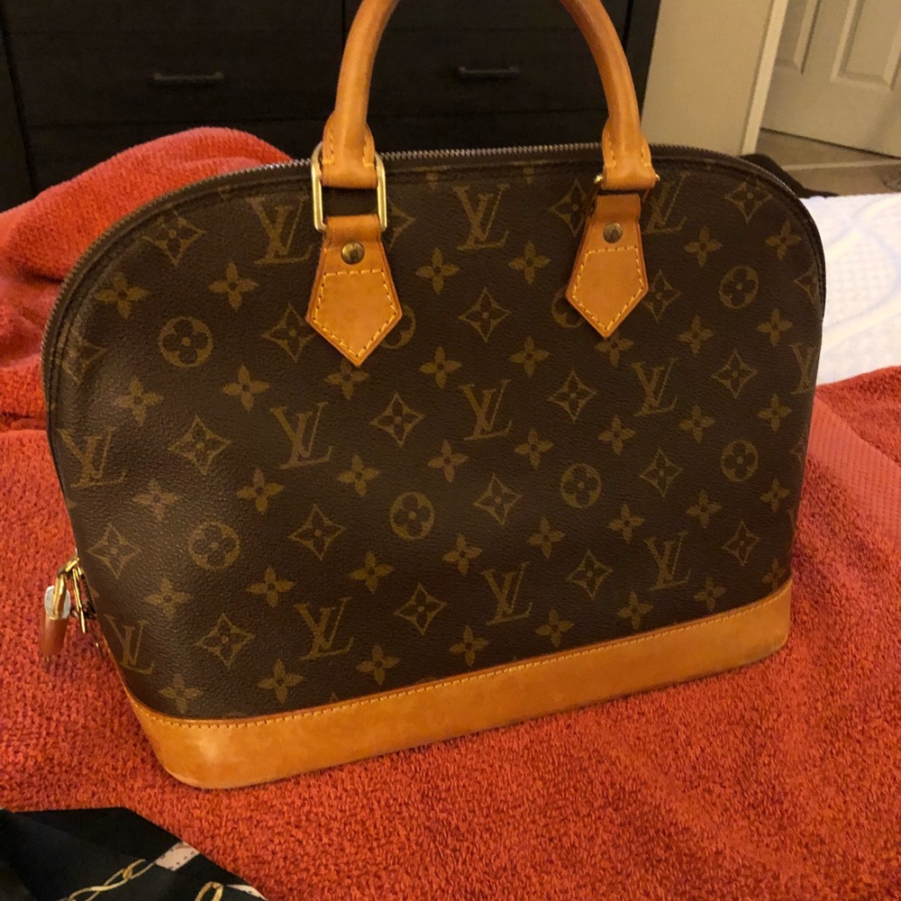 Louis Vuitton alma vintage key lock used preowned